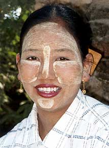 Burmese women with tanaka powdered face